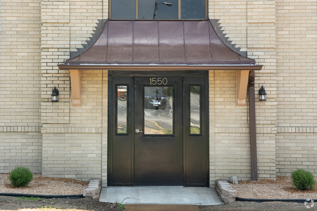 Front Door at Versailles Apartments in Ferguson